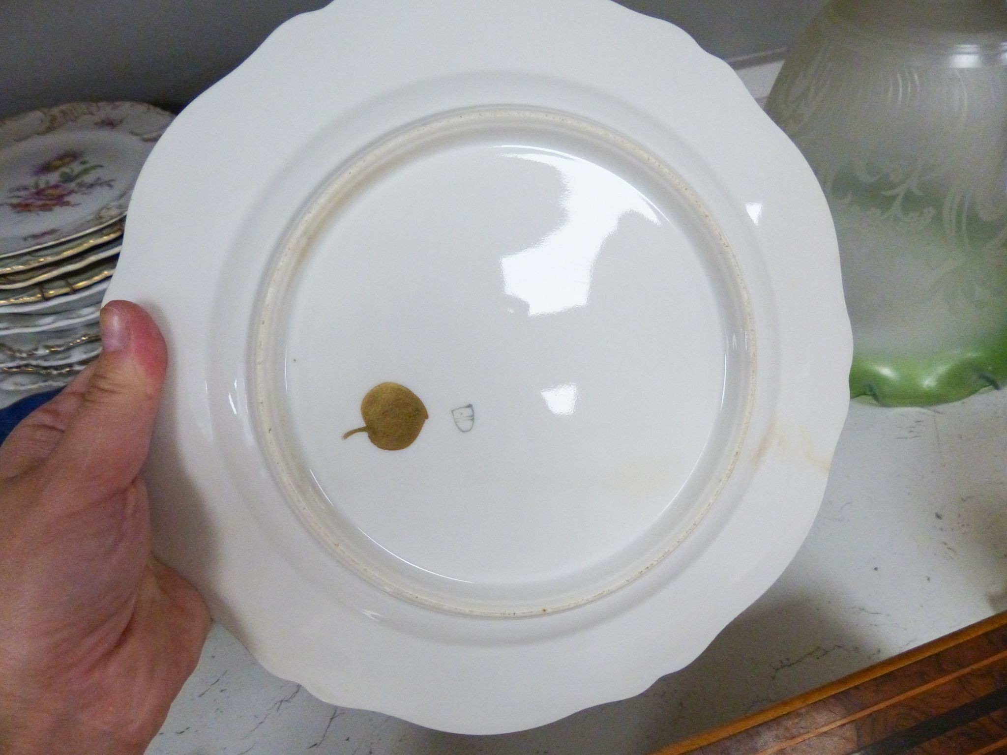 A collection of 19th/20th century Continental porcelain wall plates including a Royal Worcester powder blue fruit painted plate signed W. Bee, 23cm